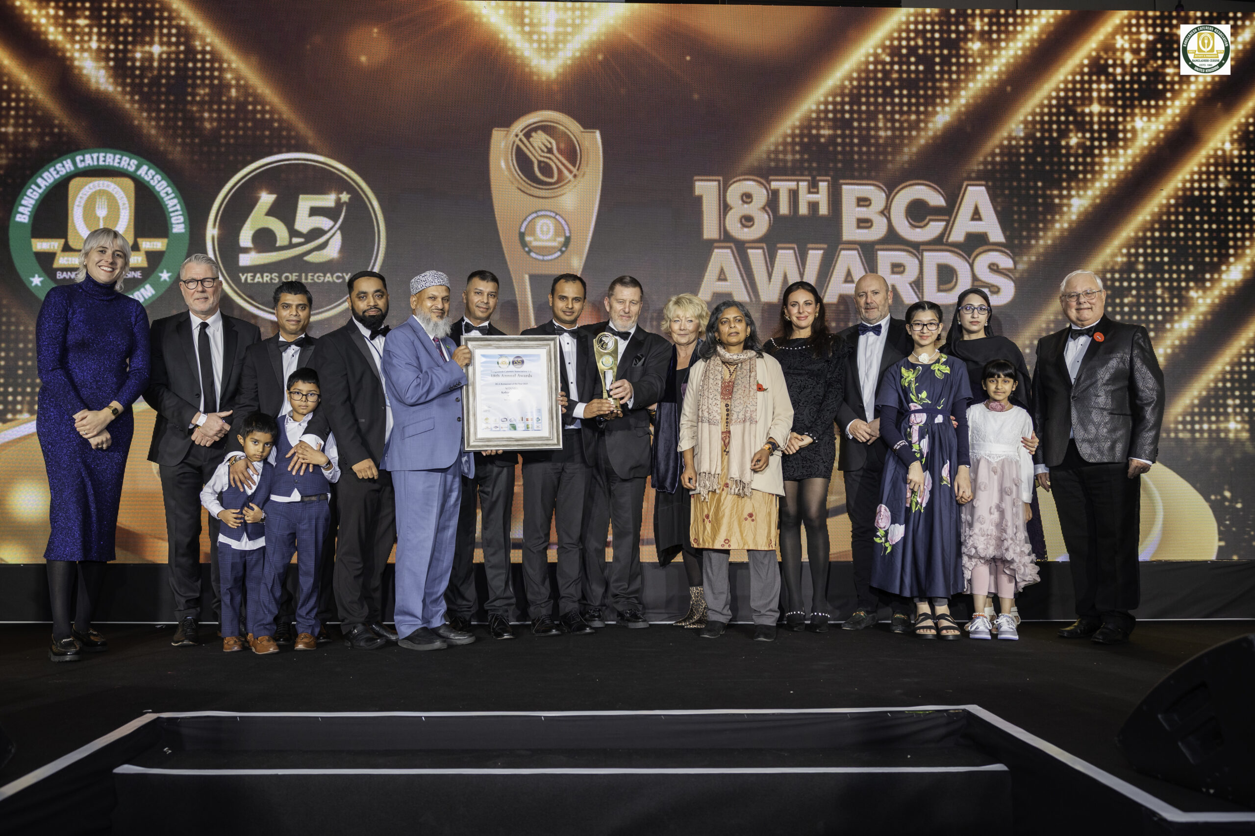 Award recipients and guests on stage at the BCA Awards